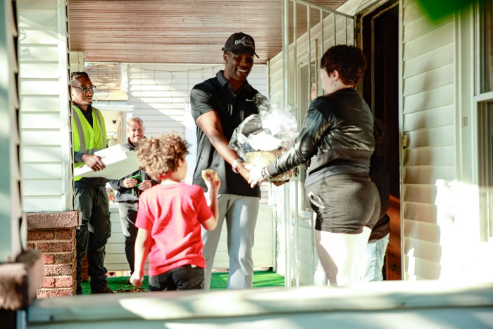 Aaliyah Cashdollar welcomes DigitalC CEO Joshua Edmonds to her home.