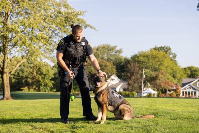 Euclid Police K-9 Cozemo, and his handler, Euclid Police Officer Paul Jablonski.
