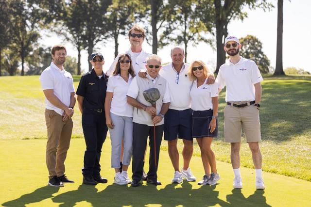 Golfers Cameron Knott, Kristina Schneider, Kim Knott, David Knott, Fred DiSanto, Angel Golic, Greg Golic, and Greg Golic.