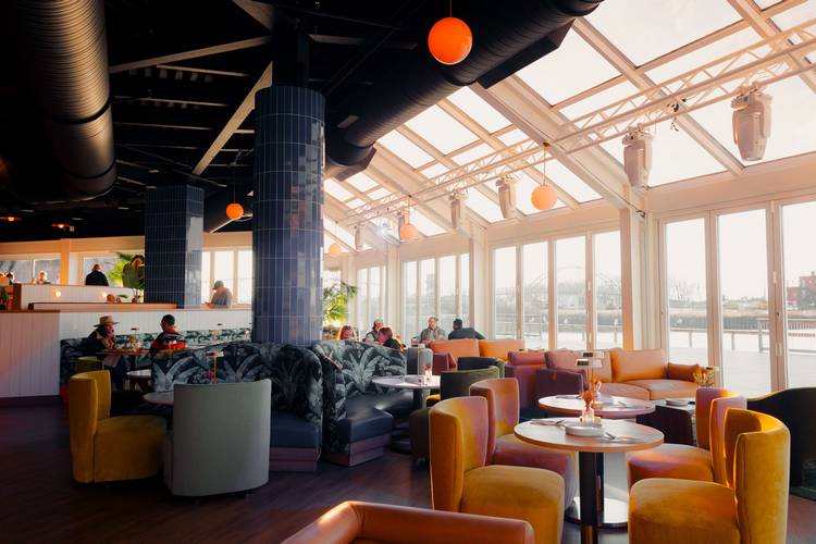 The return of Shooters on the Flats' West Bank includes a new logo, remodeled interior, and a refurbished menu.