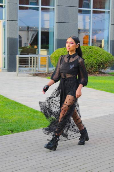 A model walks the runway, showing off some of Mayén's newest designs.