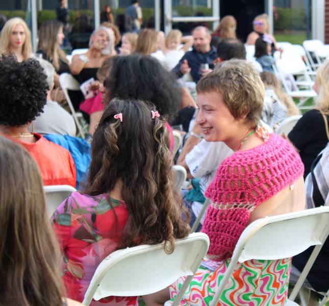 Enjoying Valerie Mayén's Glam Rock Runway Show at Lago East Bank in August.