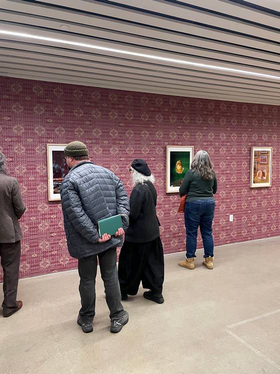 uests look at the works featured in one of the exhibits at moCa Cleveland's 2026 season opening event.