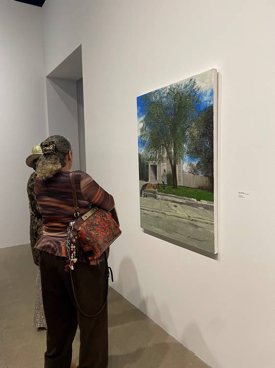 Visitors study the works at moCa Cleveland's 2026 season opening event.