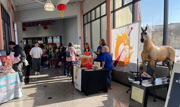 The Lunar New Year celebration at Asia Plaza featured tables with vendors and organizations.