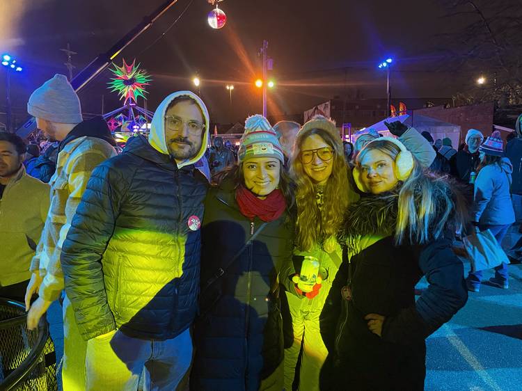 Chris, Karen, Julie, and Jenna staying warm by the fire pits and enjoying Armand Rashad on the Brite Winter Main Stage.