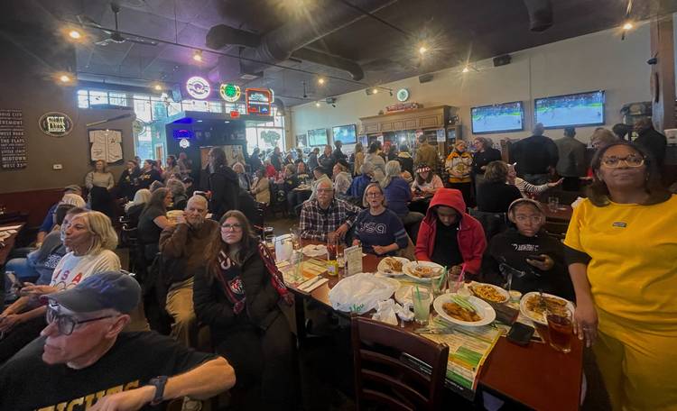 The crowd was buzzing with excitement as the women's hockey gold medal game gets underway.