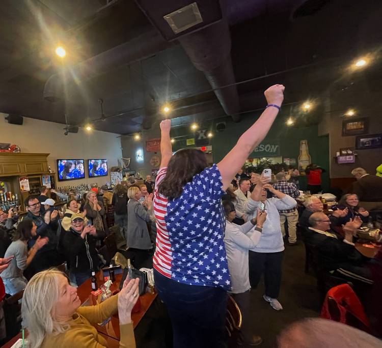 The New Heights Grill crowd goes wild with the victory.