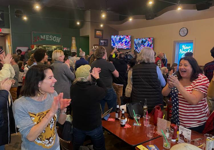 The New Heights Grill crowd goes wild with the victory.