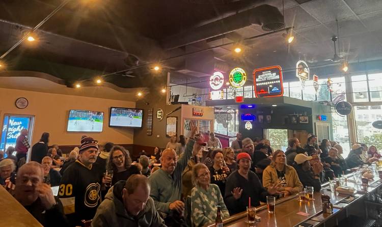 It was a packed house at New Heights Grill for the Women's Hockey Olypmic Gold Game.
