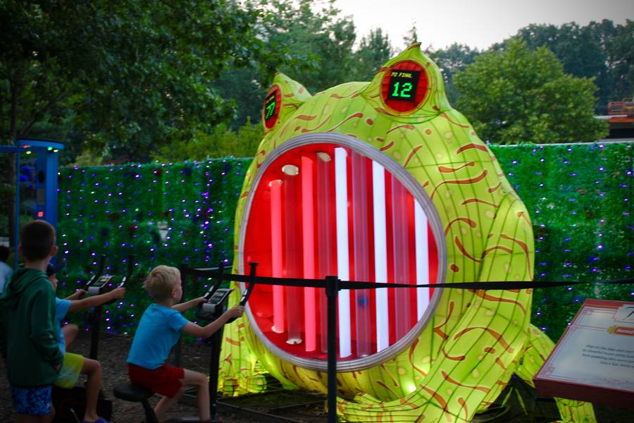 Interactive was the focus of this year's Cleveland Metroparks Zoo Asian Lantern Festival. This lantern allows children to pedal on a stationary bike to light up the mouth of the frog.