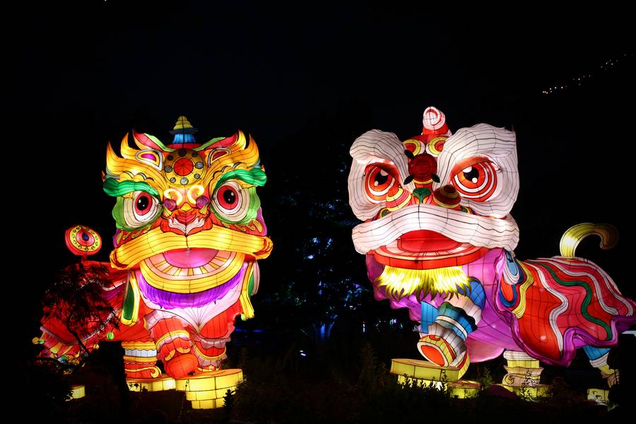 'The Lion Dance' welcomes guests to the festival with its vibrant colors and moving facial features.