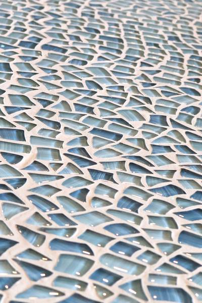 A stunning mosaic countertop enhances the costal feel of the new EDWINS Oyster Bar.
