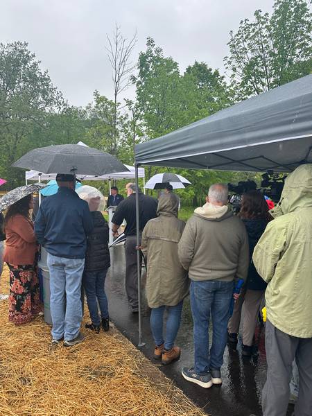 The wet weather did not deter people from coming to the Metroparks West Creek Reservation in Parma for the West Creek Greenway trail ribbon cutting.