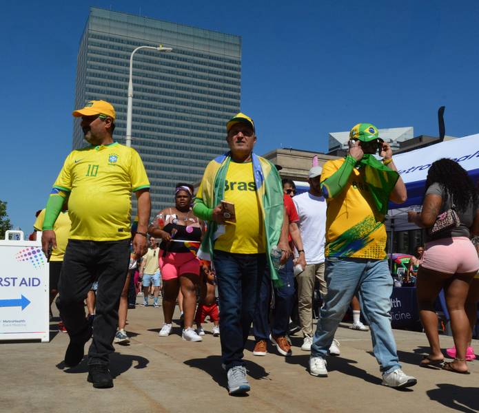 Pride participants and World Cup fans intermingled as the events overlapped.