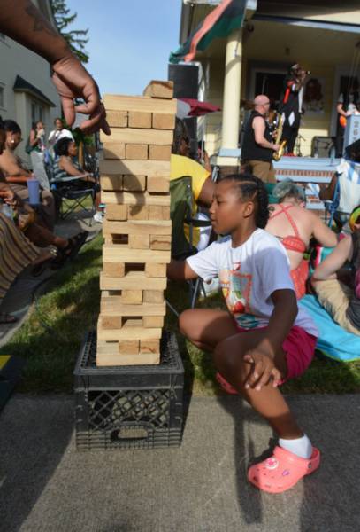Enjoying a game of giant Jenga while listening to Jinari Kemet and The Black Jackets.