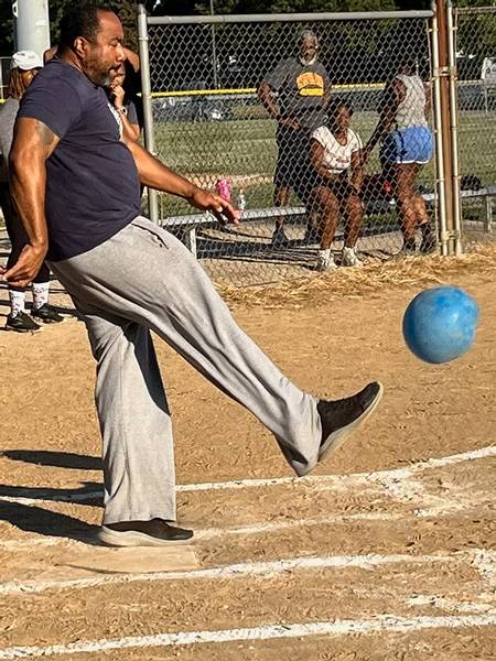 Playing kickball at One South Euclid's Recess Rewind at Bexley Park.