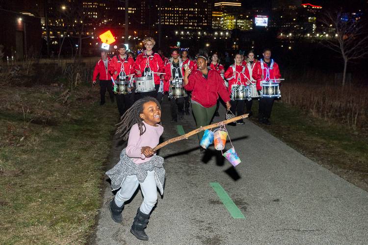 The John Marshall High School Drum Line performs during the Towpath Trail Lantern Parade 2026.