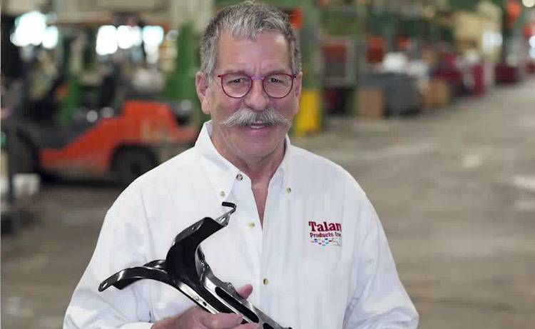 A Talan employee on the manufacturing floor.