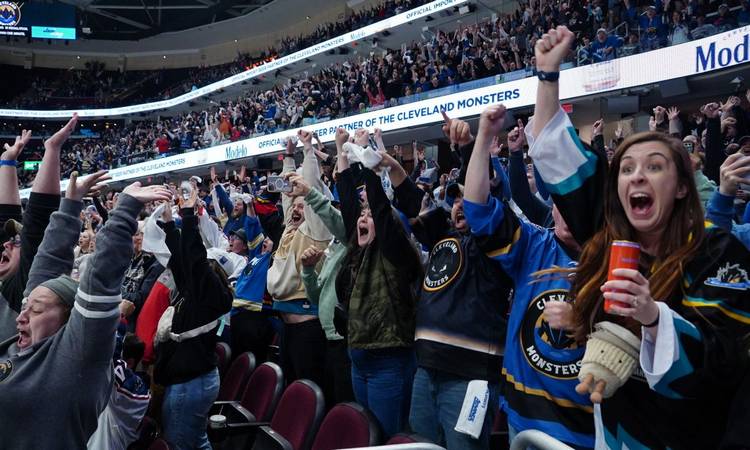 Cleveland Monsters fans cheer on the team.