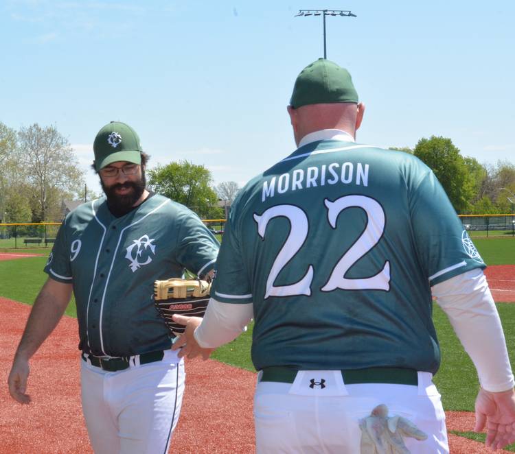 Teammate exchange on the field.