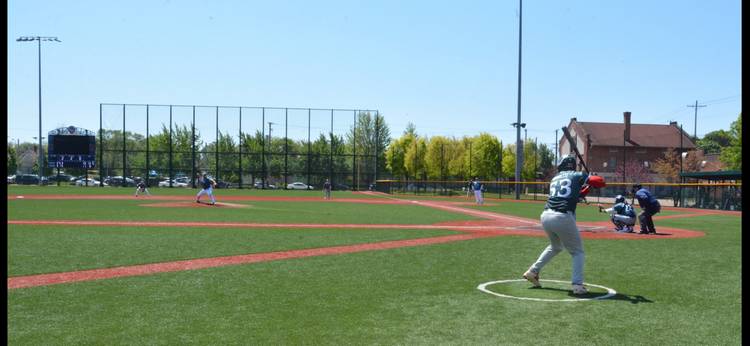 Manuel Moretti warms up in the batter box.