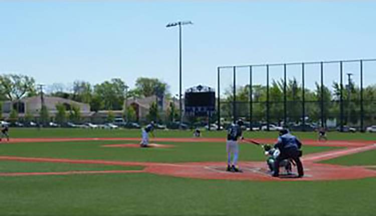 Shane Culey lines a ball down the first base line.