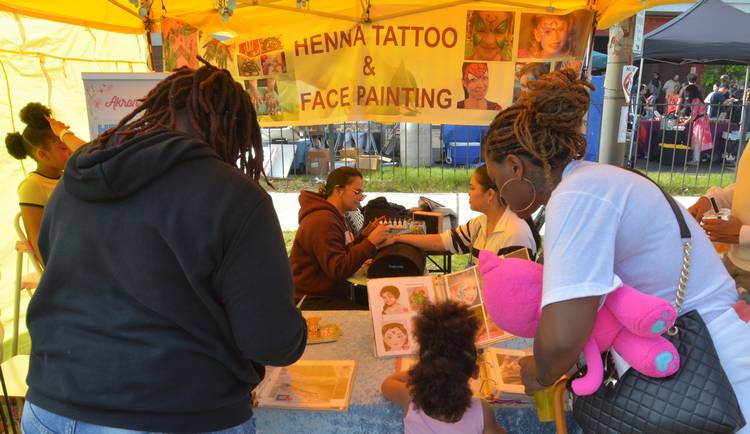 Henna tattoo and face painting.