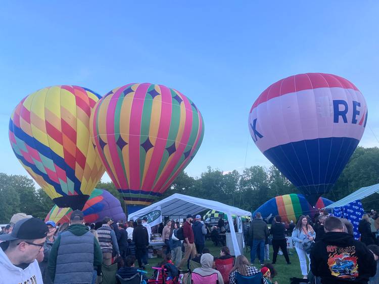 A collection of hot air balloons as Blossom Time 2025 in Chagrin Falls.