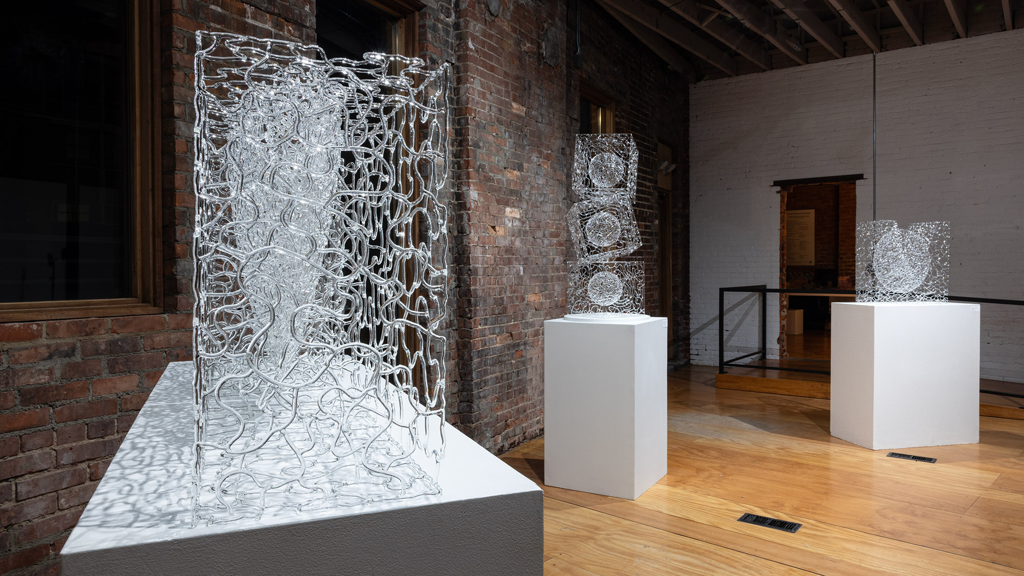 Young's work investigates the ambiguous nature of glass and its ability to create shifting perceptions of space, volume, and light.