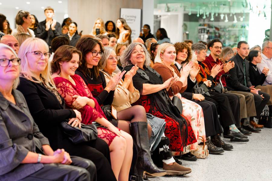 Models wear feather-inspired designs for 'Fashion & Feather,' a collaboration between the Cleveland Museum of Natural History and Kent State University.