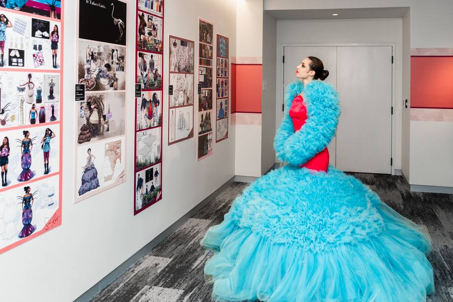 Models wear feather-inspired designs for 'Fashion & Feather,' a collaboration between the Cleveland Museum of Natural History and Kent State University.