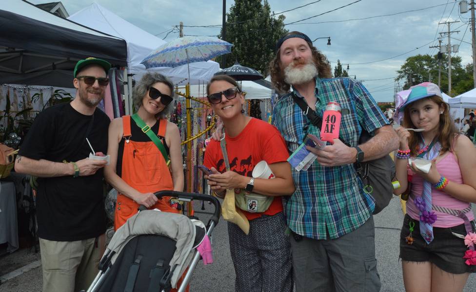Kevin, Corinne, Katie, Jeff, and Peregrine taking in the festival.