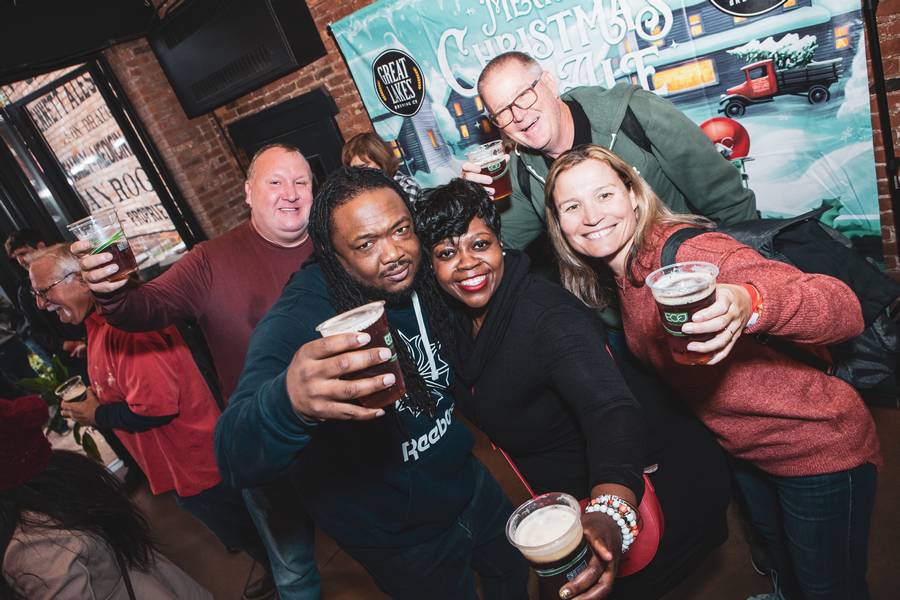 Celebrating First Pour of Great Lakes Brewing Co. Christmas Ale.