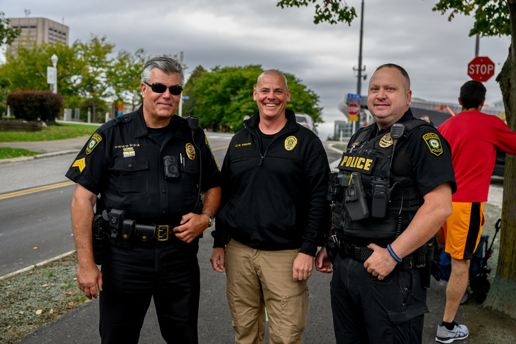 Members of the Cleveland Police Force celebrating the opening of the Mandel Community Trail.