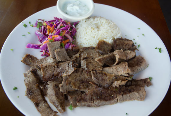 Döner - Marinated mixture of beef and lamb, cooked on a rotating spit then thinly sliced