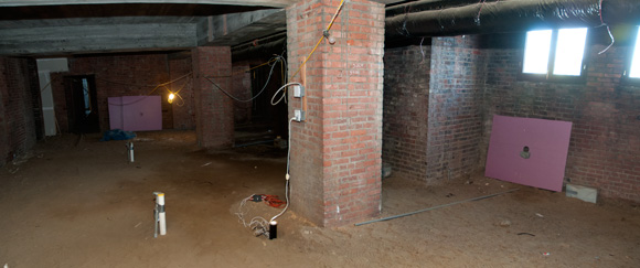 Interior of the future home of  The Spotted Owl located on the lower-level of the Tremont Place Lofts
