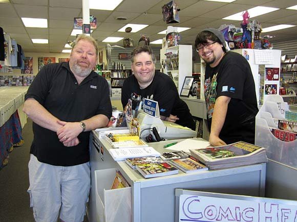 illustrated men: local comic book stores embrace city's superhero heritage