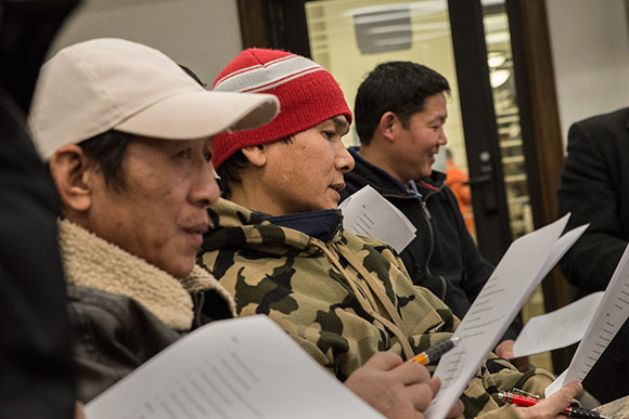 Nepali refugees practicing their English at the Welcome Hub