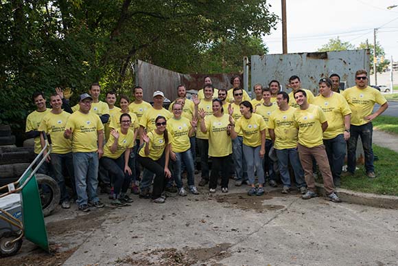 Ernst & Young volunteers gathered for a cleanup of the Euclid Railroad-Green Creek Corridor