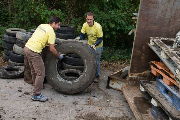 Ernst & Young volunteers gathered for a cleanup of the Euclid Railroad-Green Creek Corridor