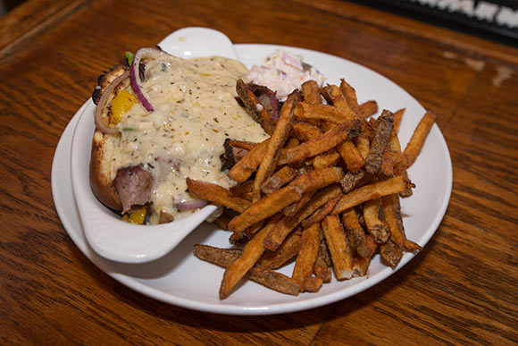 Must haves on the menu include the 'Not So Philly Cheese Steak'  at The Rib Cage