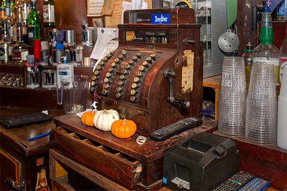 The original cash register is still behind the bar at the Harbor Inn