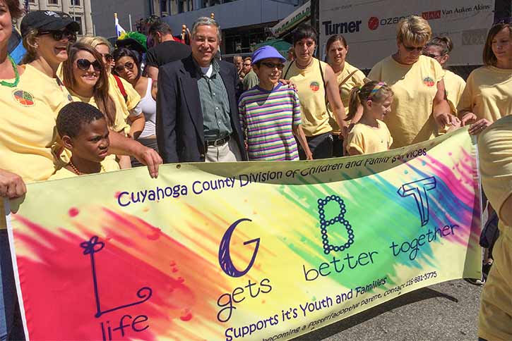 Division of Children and Family Services staff and adoptive parents/kids marched in the Pride Parade
