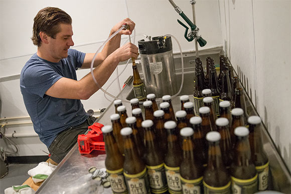 Mike Gulley back in 2014 filling bottles of Old City Soda