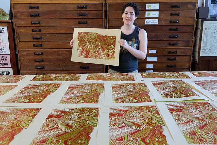 Summer intern Savannah Bustillo and her woodblock prints