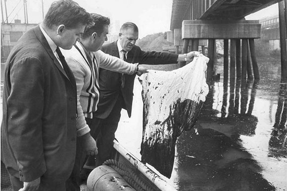 City councilmen inspect pollution in the Cuyahoga River in 1964