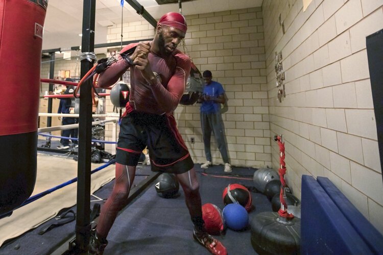 Dynomite Fred Wilson Jr. works out at Team 216's home gym at the Fairfax Recreation Center.