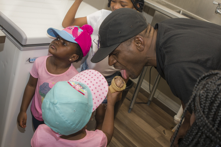 Dad gets a taste of the family ice cream