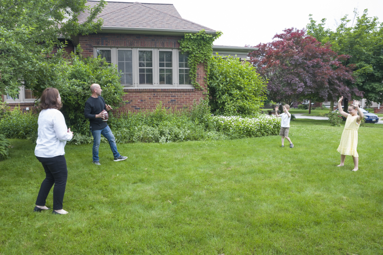 Playing a bit of catch at the Gutierrez home